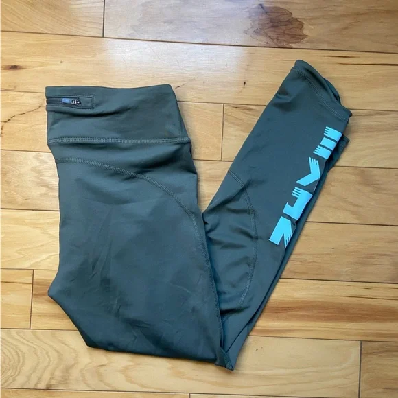 Nike Dri-Fit Running 7/8 Tights Mid Rise Tight Fit Sz Med Green Leggings NWT - Picture 1 of 9